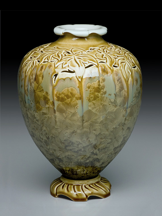 olive green carved crystalline glazed vase on carved pedestal