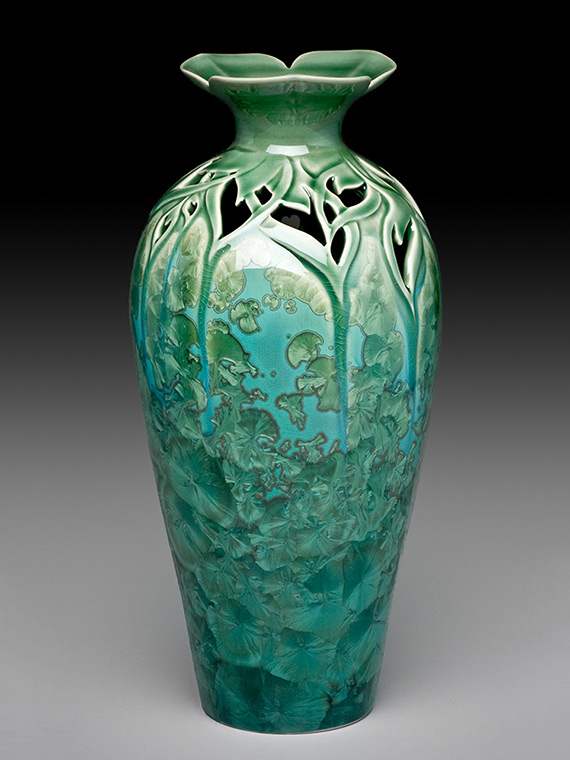 tall green carved crystalline glazed vase